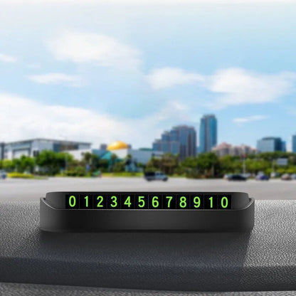 Portable concealed temporary parking sign with luminous phone number plate