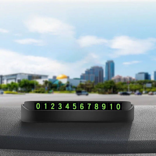 Portable concealed temporary parking sign with luminous phone number plate
